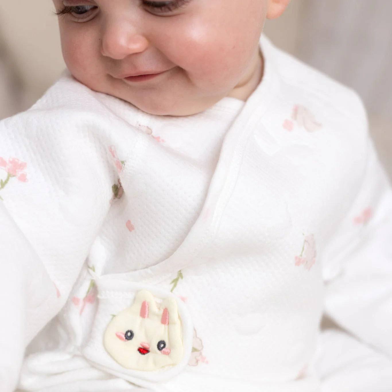 The Snuggle Bun Boucle Wrap Baby Grow Romper