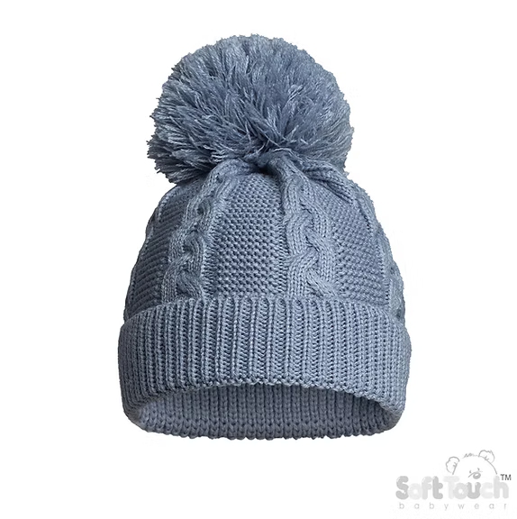 Blue knit beanie with pom-pom on a white background