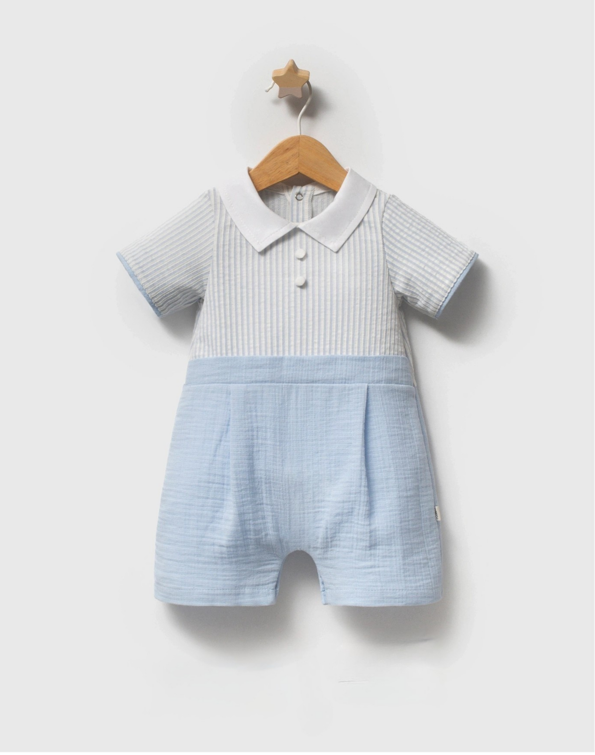 Baby romper with striped pattern on a white background